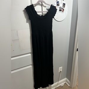 Divided black ruched top dress